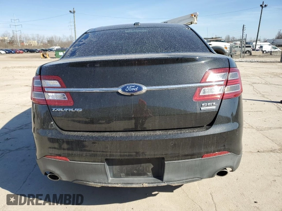 2015 Ford Taurus SEL with VIN 1FAHP2H81FG146434, listed as a Copart auction lot 50581805 with Not provided miles and Salvage title. Bid and sale history available at DreamBid. Image 6.