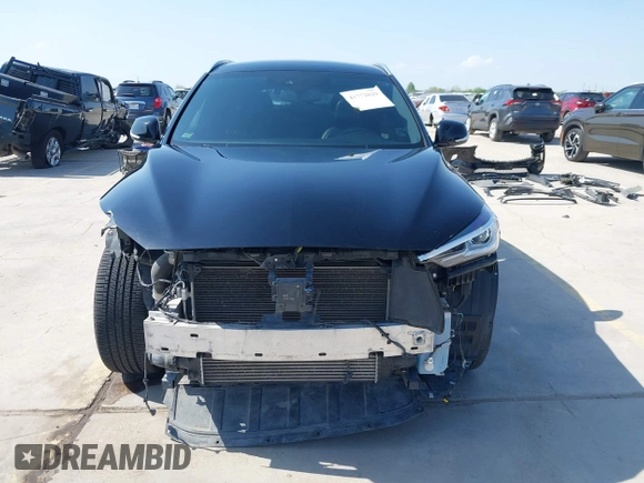 2021 Infiniti QX50 Luxe z VIN 3PCAJ5BA4MF105359, wystawiony jako IAAI lot #41772029 z przebiegiem 66 497 mil mil oraz . Historia ofert i sprzedaży dostępna na DreamBid. Obrazek 13.