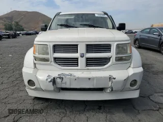 2010 Dodge Nitro SXT z VIN 1D4PT5GK8AW100343, wystawiony jako Copart lot #74628804 z przebiegiem 156 612 mil mil oraz Szkoda całkowita • Salvage title. Historia ofert i sprzedaży dostępna na DreamBid. Obrazek 5.