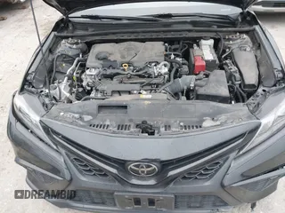 2023 Toyota Camry SE with VIN 4T1G11AK7PU123665, listed as a IAAI auction lot 41142628 with 67,294 mi miles and . Bid and sale history available at DreamBid. Image 10.