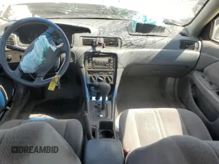 2000 Toyota Camry CE with VIN 4T1BG22K6YU710227, listed as a Copart auction lot 51963795 with 140,034 mi miles and Salvage Title. Bid and sale history available at carsss.com. Image 8.