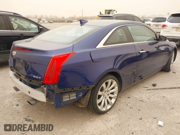 2015 Cadillac ATS Luxury AWD z VIN 1G6AH1RX6F0120173, wystawiony jako IAAI lot #41701867 z przebiegiem 70 142 mil mil oraz . Historia ofert i sprzedaży dostępna na DreamBid. Obrazek 4.