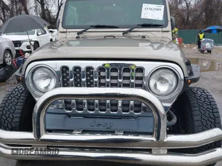 2006 Jeep Wrangler Sport Right Hand Drive with VIN 1J4F449S06P725862, listed as a IAAI auction lot 41562989 with 121,997 mi miles. Bid and sale history available at carsss.com. Image 6.