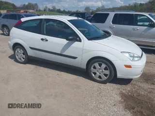 2001 Ford Focus ZX3 z VIN 3FAFP31381R210045, wystawiony jako IAAI lot #41912083 z przebiegiem 52 931 mil mil oraz . Historia ofert i sprzedaży dostępna na DreamBid. Obrazek 1.