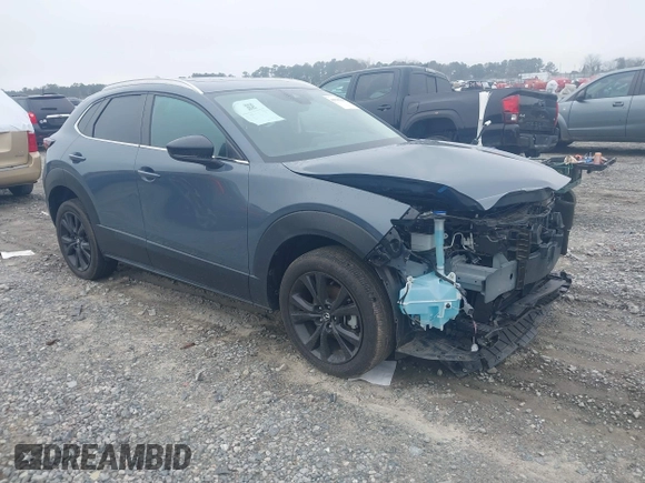 2023 Mazda CX-30 S Carbon Edition with VIN 3MVDMBCM5PM514304, listed as a IAAI auction lot 41795899 with 31,993 mi miles and . Bid and sale history available at DreamBid. Image 1.