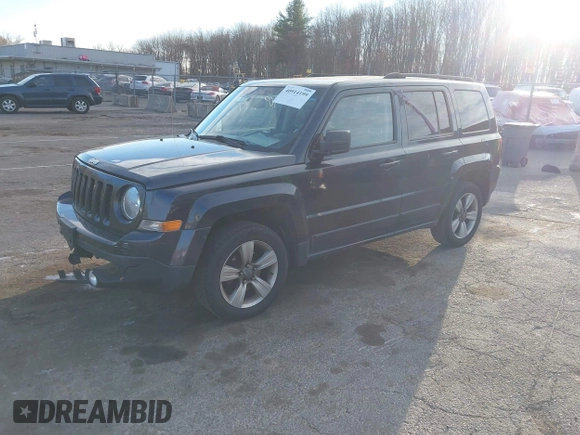 2014 Jeep Patriot Latitude with VIN 1C4NJRFB4ED720241, listed as a IAAI auction lot 40914199 with 128,218 mi miles. Bid and sale history available at carsss.com. Image 2.