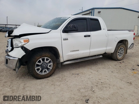 2016 Toyota Tundra 4WD Truck SR with VIN 5TFUW5F19GX561943, listed as a Copart auction lot 55828443 with 124,236 mi miles. Bid and sale history available at carsss.com. Image 1.
