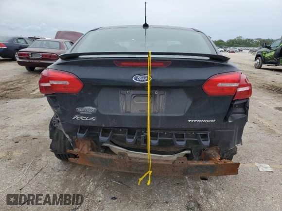2017 Ford Focus Titanium with VIN 1FADP3J23HL218867, listed as a Copart auction lot 55417305 with 98,710 mi miles and Salvage title. Bid and sale history available at DreamBid. Image 6.