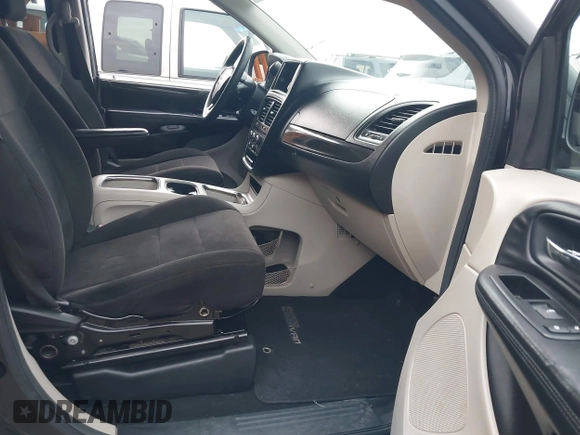 2013 Dodge Grand Caravan SXT with VIN 2C4RDGCG0DR552784, listed as a IAAI auction lot 42116395 with 96,917 mi miles and . Bid and sale history available at DreamBid. Image 5.