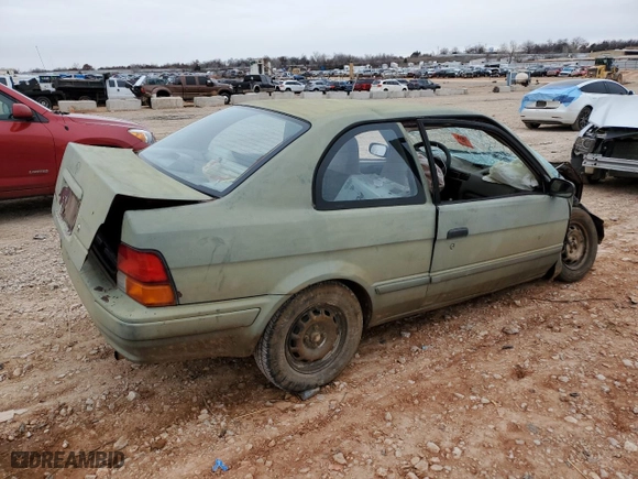 1995 Toyota Tercel DX with VIN JT2EL56D7S0084379, listed as a Copart auction lot 44722205 with 0 mi miles and Salvage Title. Bid and sale history available at carsss.com. Image 3.