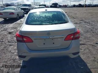 2019 Nissan Sentra S z VIN 3N1AB7APXKY372220, wystawiony jako IAAI lot #41723914 z przebiegiem 103 308 mil mil oraz . Historia ofert i sprzedaży dostępna na DreamBid. Obrazek 16.