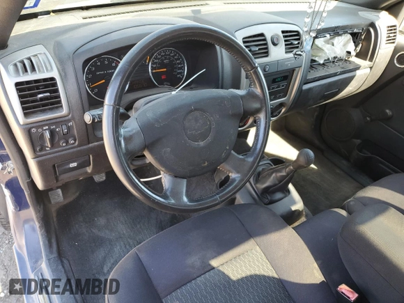 2010 Chevrolet Colorado Work Truck z VIN 1GCCSBD95A8142584, wystawiony jako Copart lot #81068474 z przebiegiem 105 670 mil mil oraz Szkoda całkowita • Salvage title. Historia ofert i sprzedaży dostępna na DreamBid. Obrazek 8.