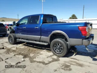 2017 Nissan Titan XD PRO-4X with VIN 1N6BA1F41HN575936, listed as a Copart auction lot 49919955 with 115,416 mi miles and Salvage Title. Bid and sale history available at carsss.com. Image 2.