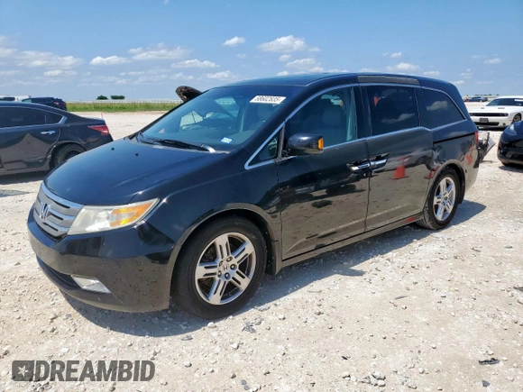 2011 Honda Odyssey Touring with VIN 5FNRL5H90BB033700, listed as a Copart auction lot 58602835 with 197,063 mi miles and Clean title. Bid and sale history available at DreamBid. Image 1.