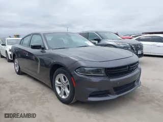 2023 Dodge Charger SXT with VIN 2C3CDXBG2PH530095, listed as a IAAI auction lot 42016658 with 50,528 mi miles. Bid and sale history available at carsss.com. Image 1.