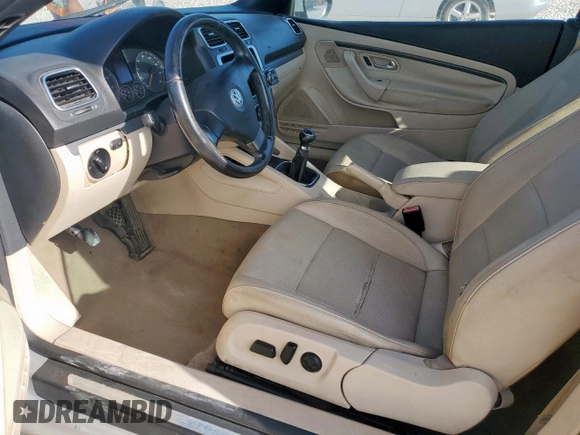 2009 Volkswagen Eos Komfort с VIN WVWAA71F99V016050, выставлен на аукционе Copart как лот 58229565 с пробегом 105 584 миль миль и Списание • Salvage title. История ставок и продаж доступна на DreamBid. Изображение 7.
