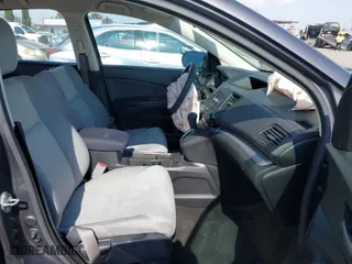 2015 Honda CR-V LX with VIN 3CZRM3H39FG706958, listed as a IAAI auction lot 41549880 with 85,567 mi miles. Bid and sale history available at carsss.com. Image 5.
