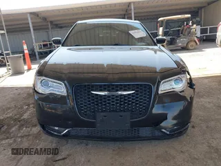 2018 Chrysler 300 S with VIN 2C3CCABGXJH254868, listed as a IAAI auction lot 41992014 with 173,593 mi miles and . Bid and sale history available at DreamBid. Image 13.