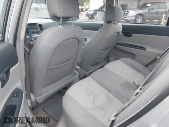 2006 Hyundai Accent GLS with VIN KMHCN46C46U035208, listed as a IAAI auction lot 41769016 with 141,065 mi miles. Bid and sale history available at carsss.com. Image 8.
