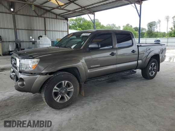 2009 Toyota Tacoma PreRunner with VIN 3TMKU72N89M021378, listed as a Copart auction lot 57142405 with 199,745 mi miles and Salvage title. Bid and sale history available at DreamBid. Image 1.