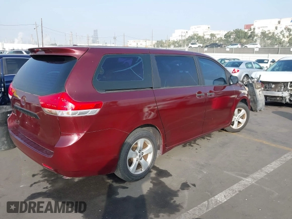 2011 Toyota Sienna with VIN 5TDZK3DCXBS157316, listed as a IAAI auction lot 41240896 with 117,437 mi miles. Bid and sale history available at carsss.com. Image 4.