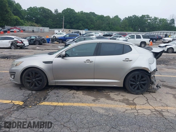 2015 Kia Optima SX with VIN 5XXGR4A73FG372494, listed as a IAAI auction lot 42345043 with 196,911 mi miles and . Bid and sale history available at DreamBid. Image 14.