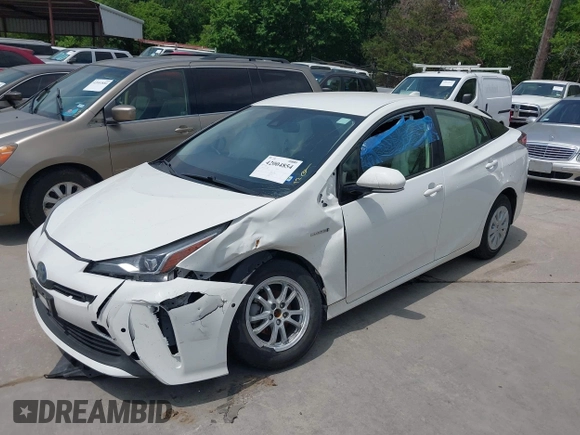 2020 Toyota Prius L Eco with VIN JTDKARFU9L3108236, listed as a IAAI auction lot 42004854 with 89,528 mi miles and . Bid and sale history available at DreamBid. Image 2.