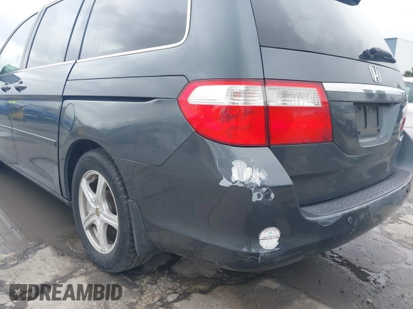 2005 Honda Odyssey TOURING with VIN 5FNRL38895B061480, listed as a IAAI auction lot 41807150 with 190,261 mi miles. Bid and sale history available at carsss.com. Image 6.