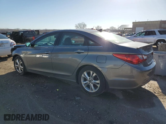 2013 Hyundai Sonata Limited with VIN 5NPEC4AC1DH677807, listed as a Copart auction lot 84562644 with 97,325 mi miles and Salvage Title. Bid and sale history available at DreamBid. Image 2.