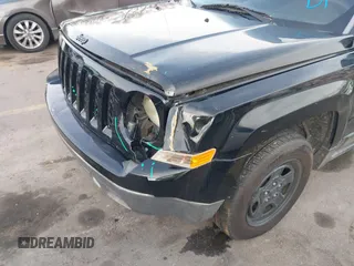 2013 Jeep Patriot Sport with VIN 1C4NJPBA3DD237887, listed as a IAAI auction lot 41599995 with 144,673 mi miles and . Bid and sale history available at DreamBid. Image 6.