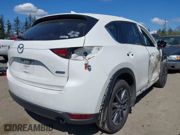 2017 Mazda CX-5 Grand Touring with VIN JM3KFBDL9H0163031, listed as a IAAI auction lot 42098819 with 81,781 mi miles. Bid and sale history available at carsss.com. Image 4.