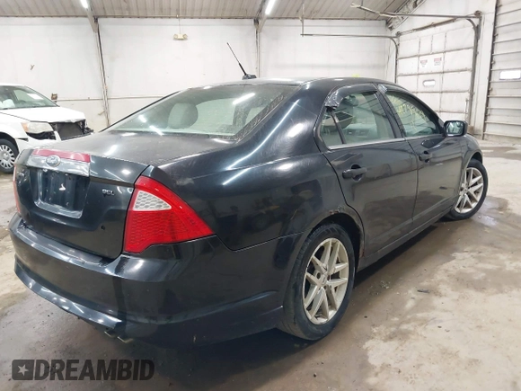 2012 Ford Fusion SEL z VIN 3FAHP0JA6CR122930, wystawiony jako IAAI lot #42789619 z przebiegiem 191 000 mil mil oraz . Historia ofert i sprzedaży dostępna na DreamBid. Obrazek 4.