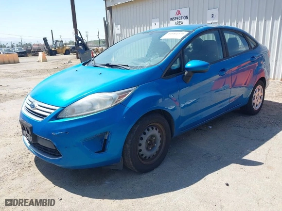 2012 Ford Fiesta SE with VIN 3FADP4BJ8CM162119, listed as a IAAI auction lot 41884379 with 129,200 mi miles. Bid and sale history available at carsss.com. Image 2.