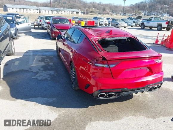 2023 Kia Stinger GT2 with VIN KNAE55LC4P6138316, listed as a IAAI auction lot 41358179 with 7,971 mi miles. Bid and sale history available at carsss.com. Image 3.