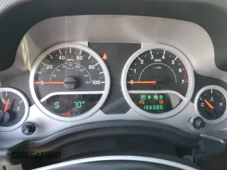 2010 Jeep Wrangler Sport with VIN 1J4AA2D16AL144842, listed as a Copart auction lot 50173535 with 106,000 mi miles and Salvage Title. Bid and sale history available at carsss.com. Image 9.