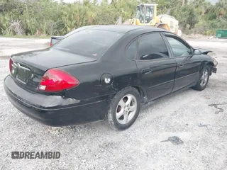 2003 Ford Taurus SES Standard with VIN 1FAFP55223A152802, listed as a IAAI auction lot 42390857 with 141,673 mi miles and . Bid and sale history available at DreamBid. Image 4.