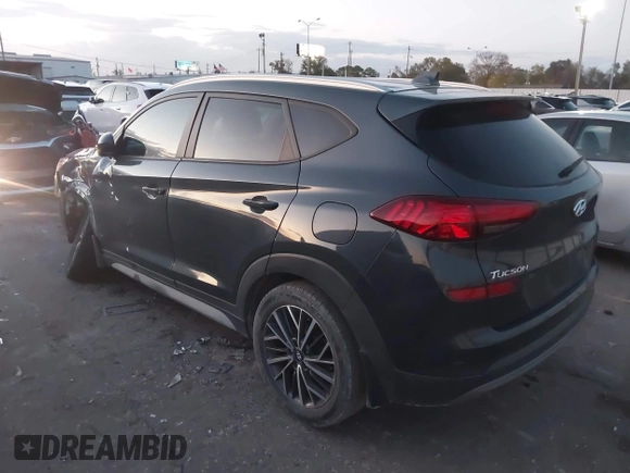 2019 Hyundai Tucson Sport with VIN KM8J33AL7KU901296, listed as a IAAI auction lot 41132884 with 76,948 mi miles. Bid and sale history available at carsss.com. Image 3.