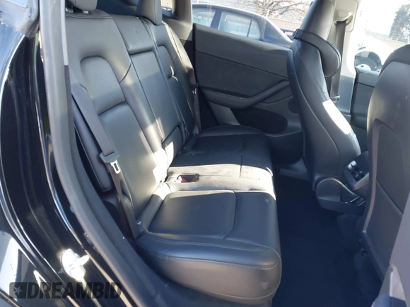 2024 Tesla Model Y Long Range with VIN 7SAYGDEEXRF983040, listed as a IAAI auction lot 41555332 with 79,506 mi miles and . Bid and sale history available at DreamBid. Image 8.