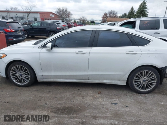 2015 Ford Fusion SE with VIN 3FA6P0H9XFR181132, listed as a IAAI auction lot 41075635 with 216,089 mi miles and . Bid and sale history available at DreamBid. Image 15.