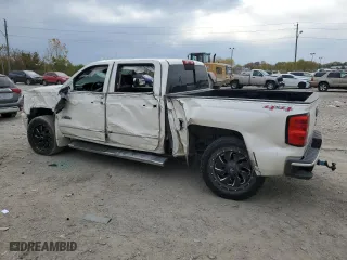 2015 Chevrolet Silverado 1500 High Country with VIN 3GCUKTEC9FG121324, listed as a Copart auction lot 77551124 with 104,037 mi miles and Salvage Title. Bid and sale history available at carsss.com. Image 2.