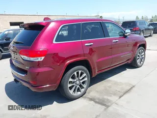 2017 Jeep Grand Cherokee Overland with VIN 1C4RJFCTXHC676236, listed as a IAAI auction lot 42164645 with 94,658 mi miles and . Bid and sale history available at DreamBid. Image 4.
