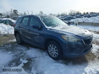 2013 Mazda CX-5 Sport with VIN JM3KE2BE5D0156093, listed as a IAAI auction lot 41246470 with 153,644 mi miles. Bid and sale history available at carsss.com. Image 1.