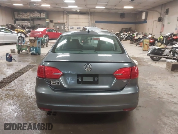 2014 Volkswagen Jetta TDI w/Premium with VIN 3VWLL7AJ4EM425825, listed as a IAAI auction lot 41519621 with 154,486 mi miles and . Bid and sale history available at DreamBid. Image 16.