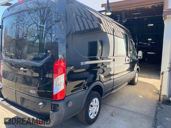 2015 Ford Transit Cargo with VIN 1FTNR2CMXFKA85769, listed as a Copart auction lot 53966365 with 147,051 mi miles and Clean title. Bid and sale history available at DreamBid. Image 4.
