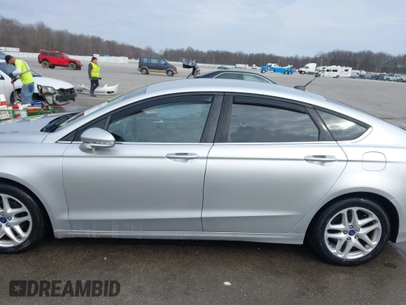 2014 Ford Fusion SE with VIN 3FA6P0HD4ER328113, listed as a IAAI auction lot 41702538 with 126,044 mi miles and . Bid and sale history available at DreamBid. Image 14.