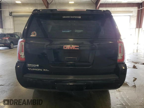 2018 GMC Yukon XL SLT with VIN 1GKS2GKC4JR309037, listed as a Copart auction lot 65954554 with 97,216 mi miles and Salvage Title. Bid and sale history available at carsss.com. Image 6.
