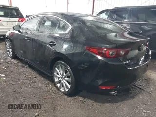 2023 Mazda 3 S Preferred with VIN 3MZBPACM0PM352430, listed as a IAAI auction lot 41738230 with 17,632 mi miles and . Bid and sale history available at DreamBid. Image 3.