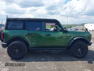 2023 Ford Bronco with VIN 1FMEE5DP0PLB80676, listed as a IAAI auction lot 42210054 with 6,796 mi miles and . Bid and sale history available at DreamBid. Image 12.