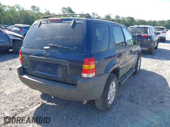 2004 Ford Escape XLT with VIN 1FMYU03114DA07741, listed as a IAAI auction lot 42332830 with 210,556 mi miles and . Bid and sale history available at DreamBid. Image 4.