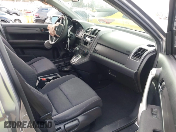 2007 Honda CR-V LX with VIN JHLRE38397C020722, listed as a IAAI auction lot 42100516 with 161,561 mi miles. Bid and sale history available at carsss.com. Image 5.